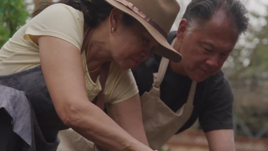 Man and woman gardening