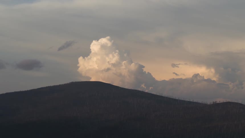 Clouds are moving along the hills