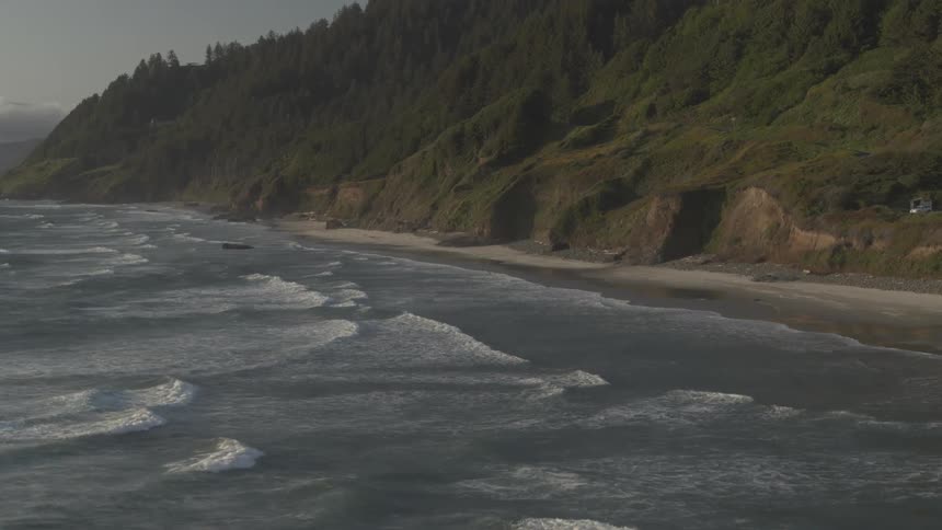 Waves crashing towards the shoreline