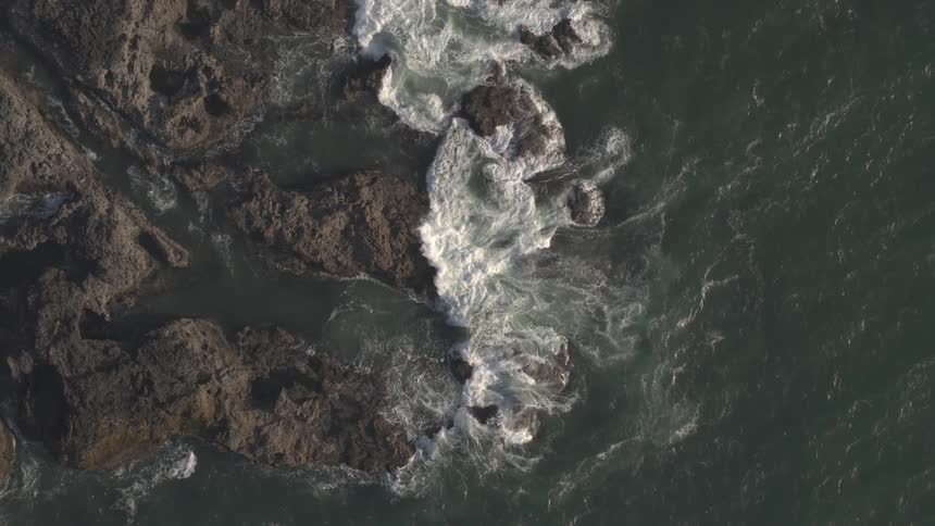 Waves crashing on a rocky shore