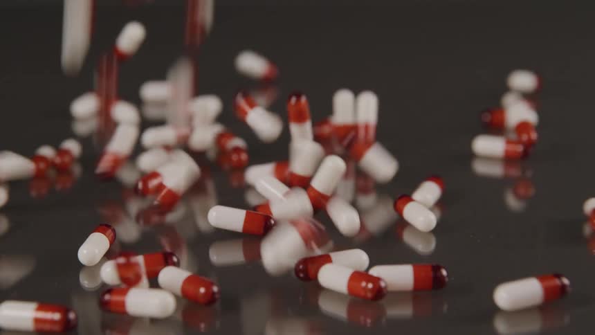 Capsules are dropped from above