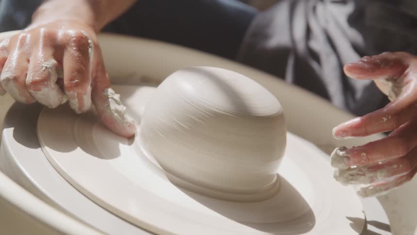 Male molding clay on a table