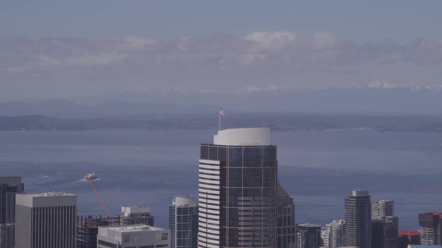 An aerial view of a downtown city is displayed