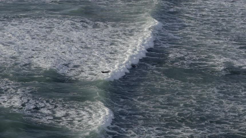 Water Flowing in the Ocean With Gentle Ripples and Waves Under Natural Daylight.