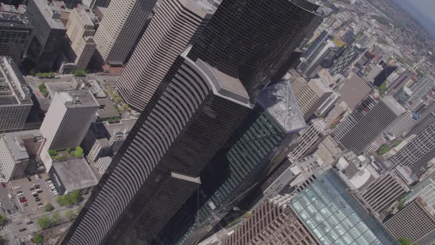 An aerial view of skyscrapers in a downtown city
