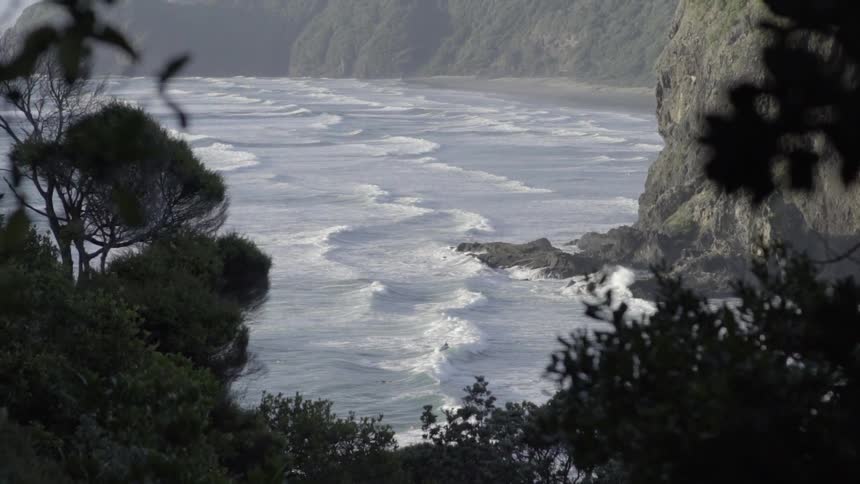Waves are crashing on the shore