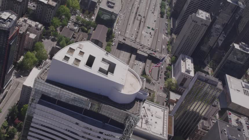 An aerial view of a tower in the middle of city