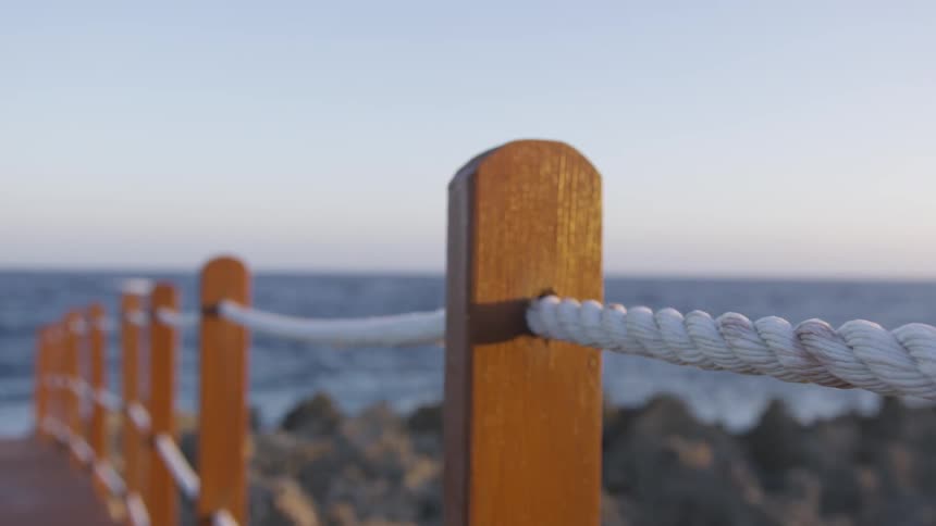 Railing along a beach