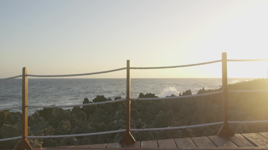 A scenery of peaceful sea from the bridge