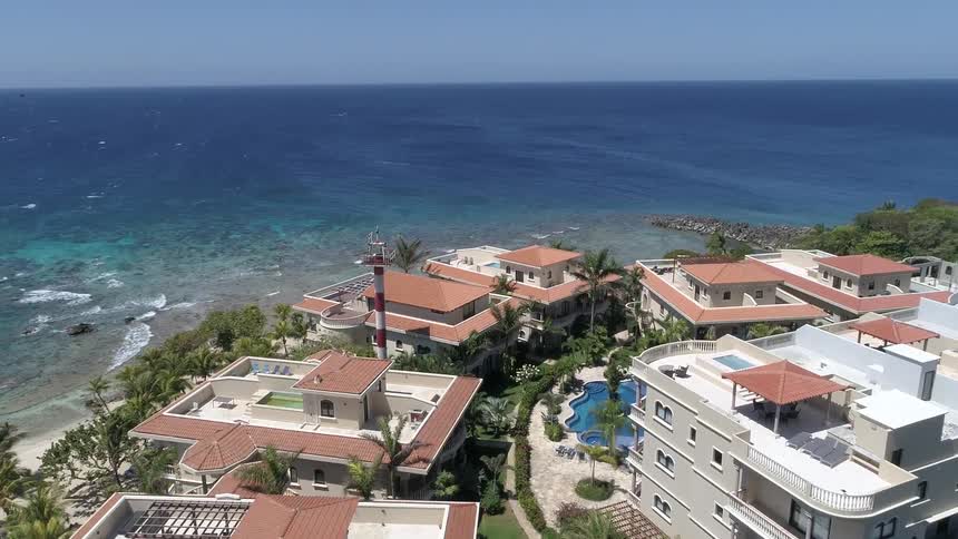 Large homes border the ocean coast line