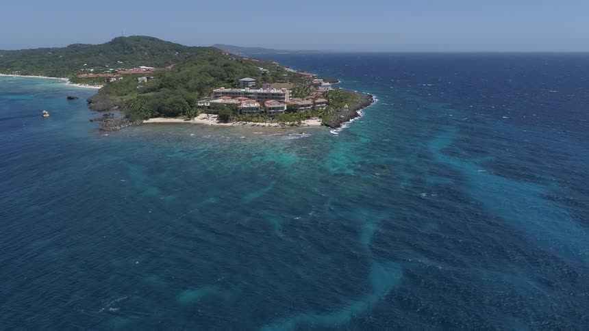 Ocean waters roll towards the resort area