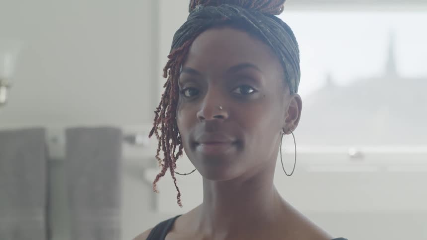 Young black woman smile at the camera