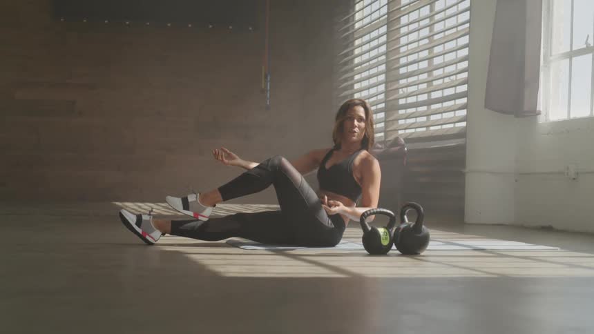 Girl working out doing sit ups