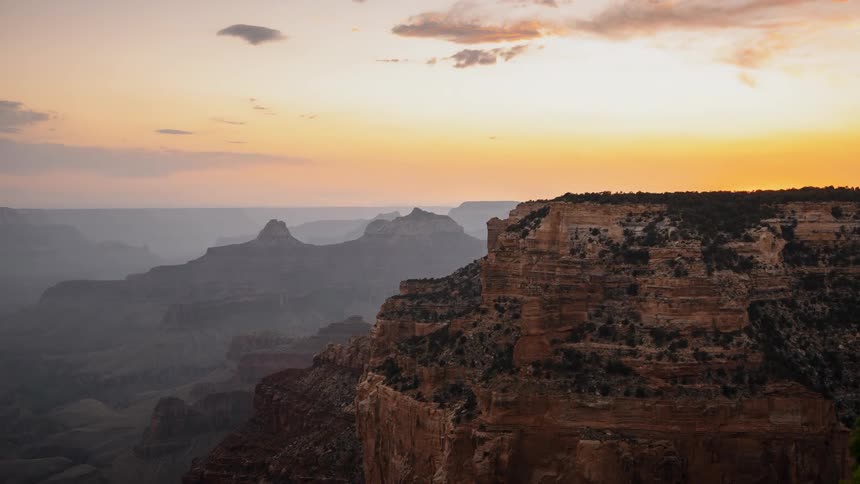 Landscape view of a cliff with the sun setting