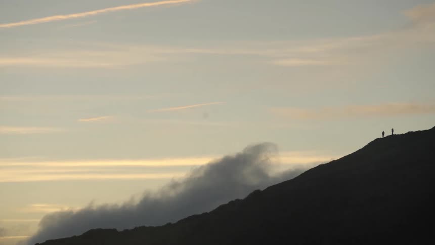 Smoke is moving along the mountainside