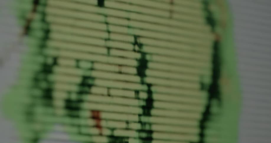 An abstract of a close up look of a monitor pixels