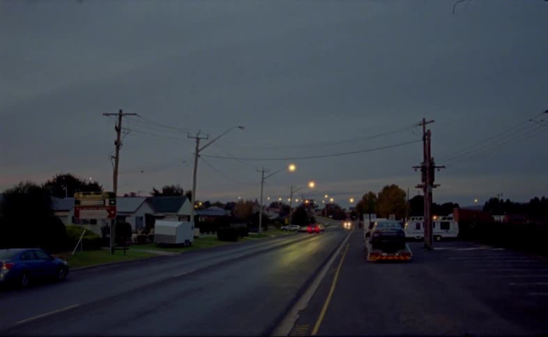 Cars are driving on a road