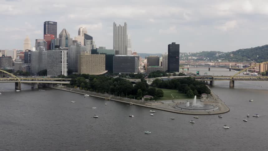 An aerial shot of a city by a river