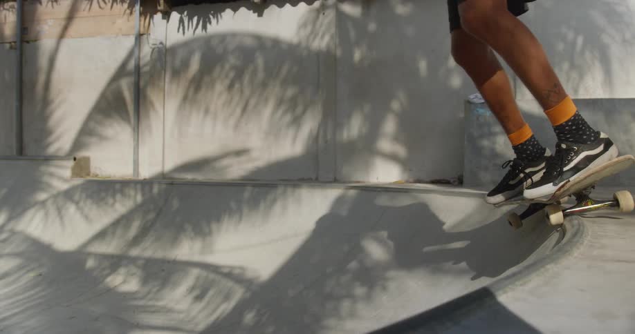 A man is skateboarding outdoors