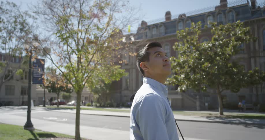 Man looking at the campus surrounding
