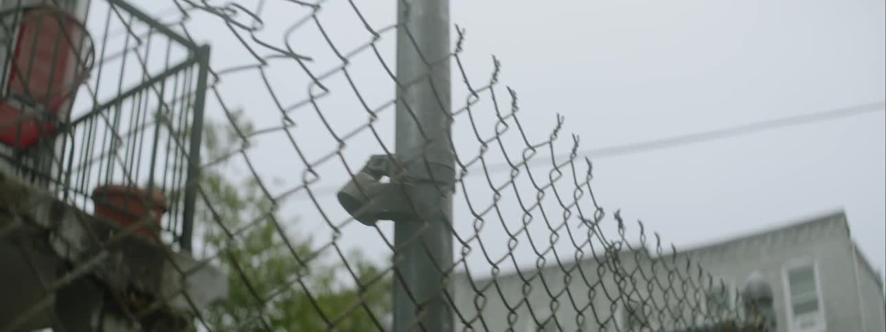 A fence is around a house