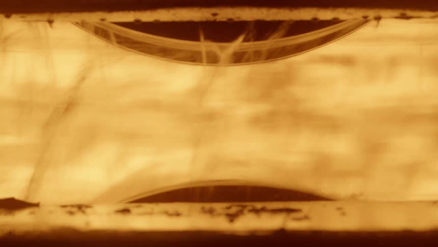 Close up of a tool causing sparks and flames