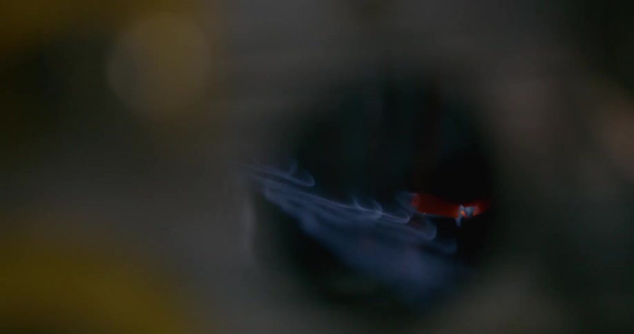 A lit stove with its blue flame