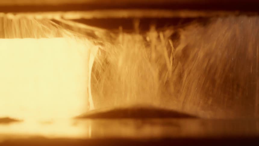 A machine rotating spilling water