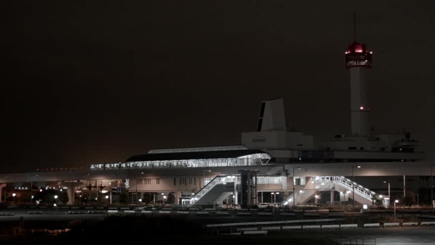 Lights illuminate an airport at night