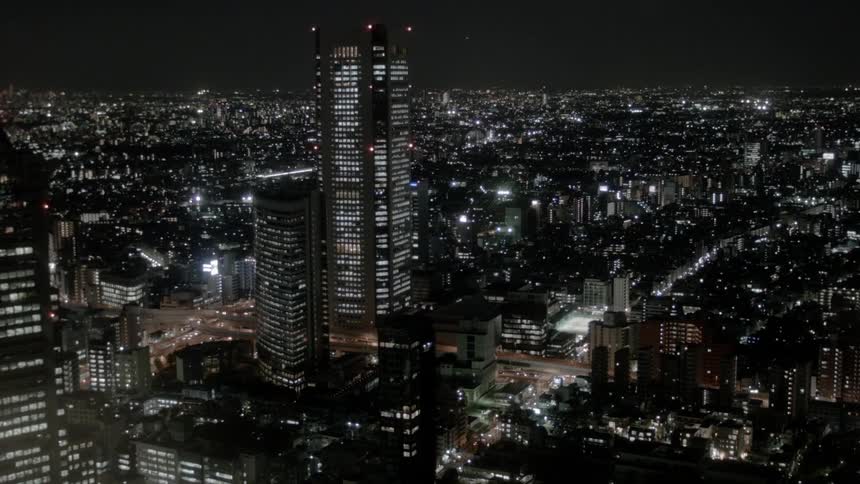 The city is brightly lit at night