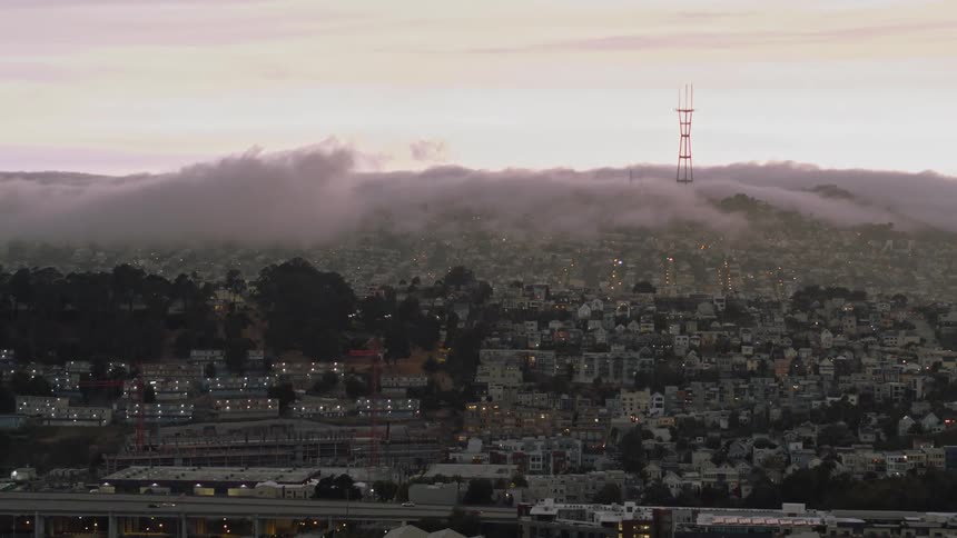 A city sprawls across a hillside