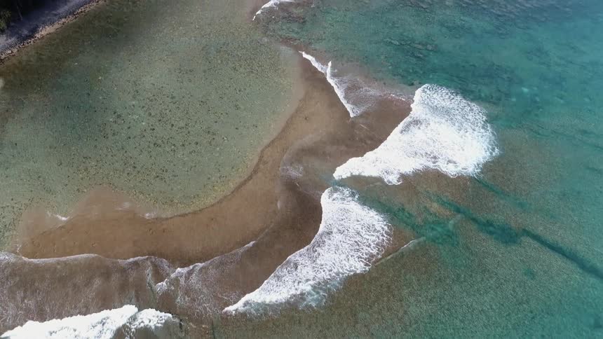 Waves are moving along the coast