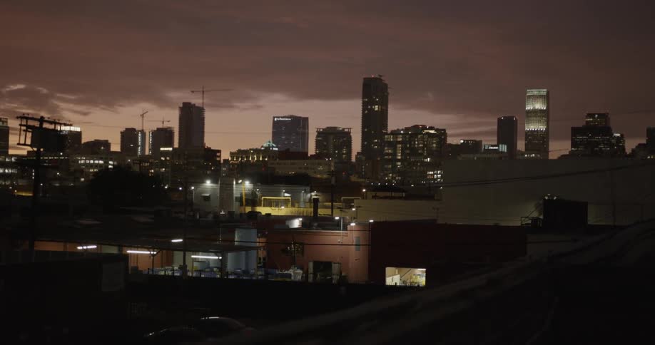 Skyline of the city with tall buildings at dusk