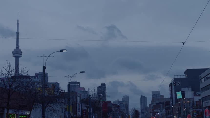 Aerial view of a city on a cloudy evening