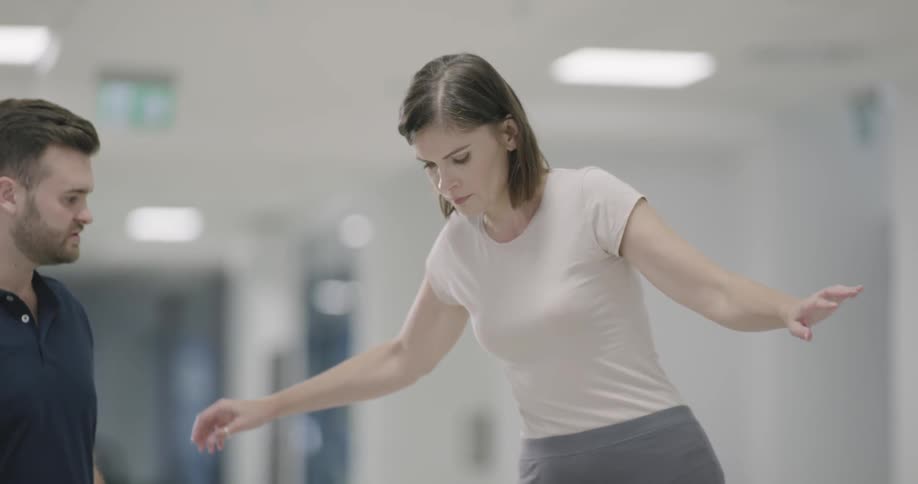 A woman is doing physical therapy in the hospital