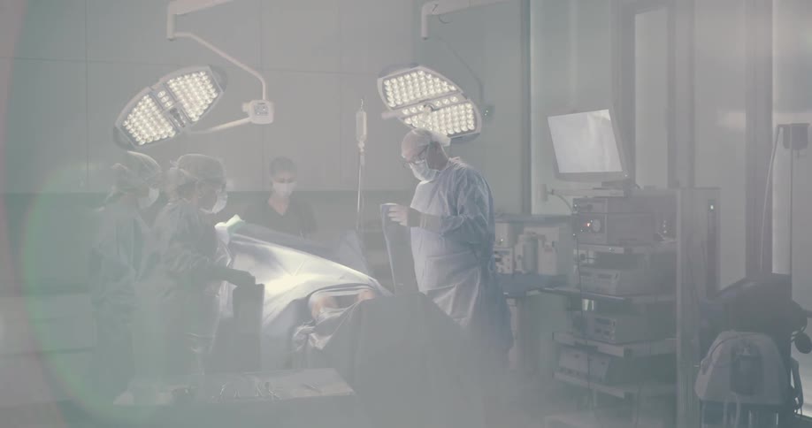 Doctor and nurses doing surgery at the operating theater