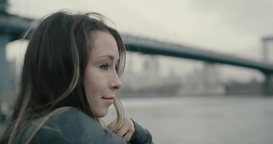 A woman is stretching outdoors