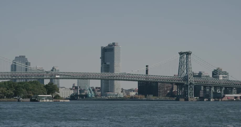 Suspension bridge over river on a city