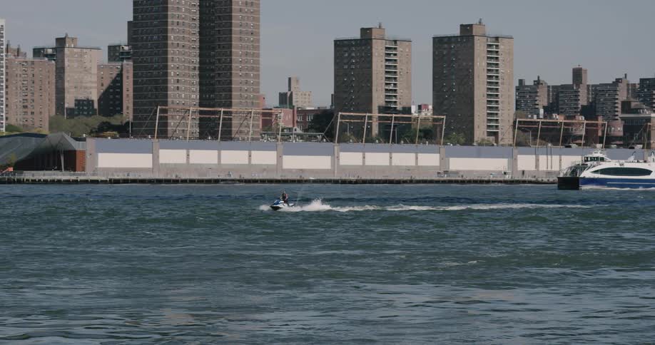 A man playing jet ski at the river