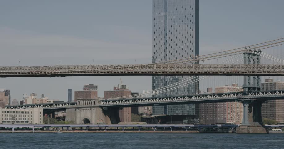 Bridges highways and buildings in a city near a river