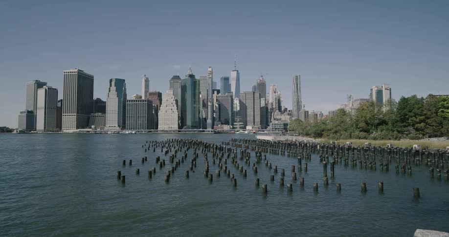 A scenery of a metropolitan city from the riverbank