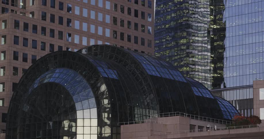 Large glass building in a downtown city area