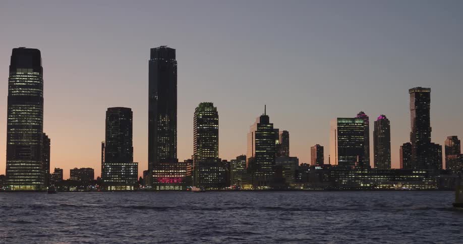 A scenery of a city skyline at dawn
