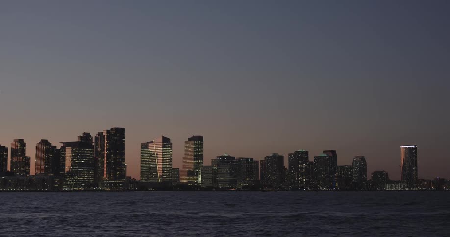 A scenery of a city skyline at dawn