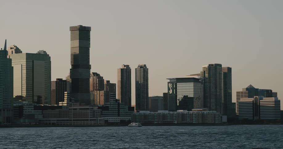A static shot of a downtown city at dusk