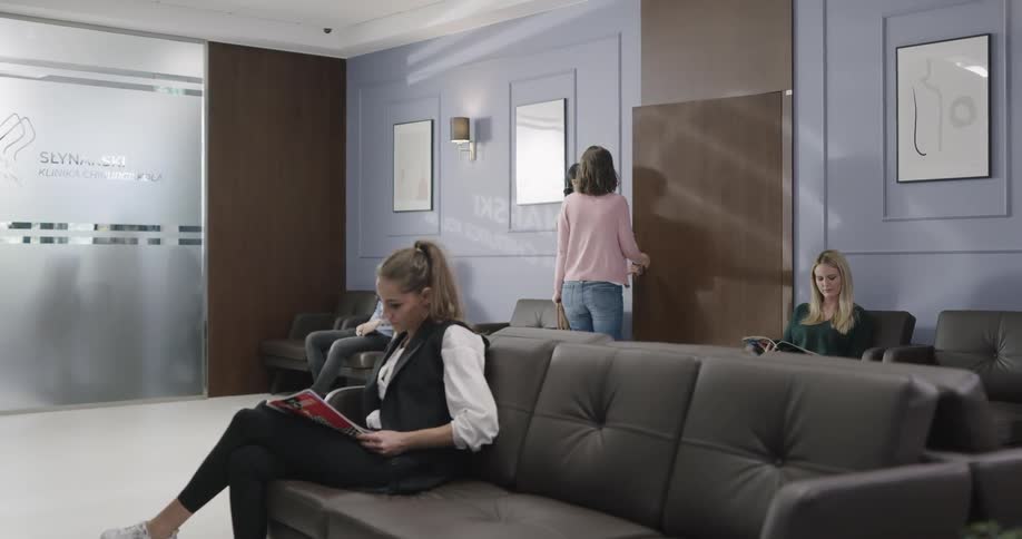 Patients sit in pleasant clinic waiting room