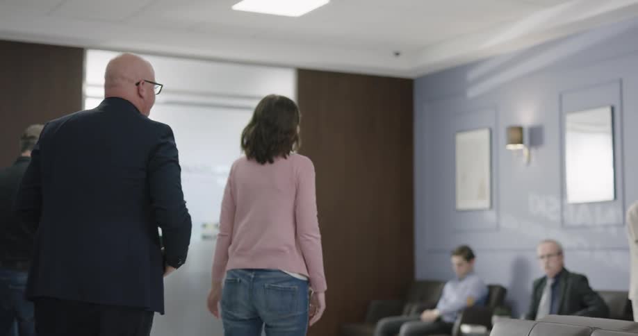 Patient consulting to a doctor on a lobby