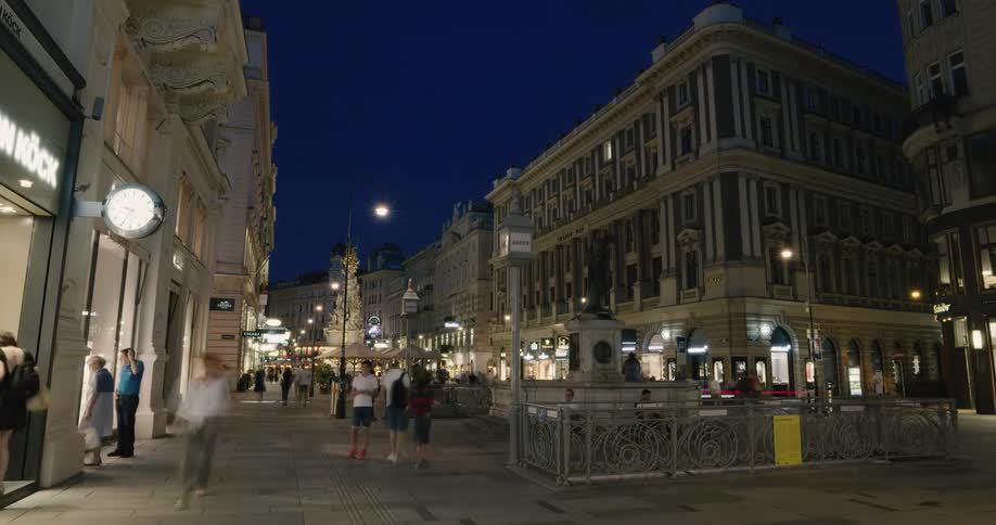 A time lapse of a city square at night