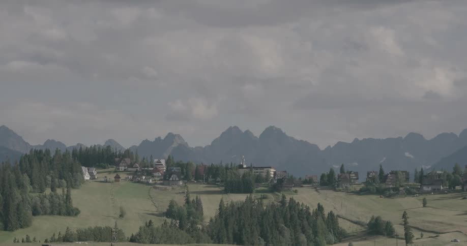 A time lapse of a cloud system passing over a town