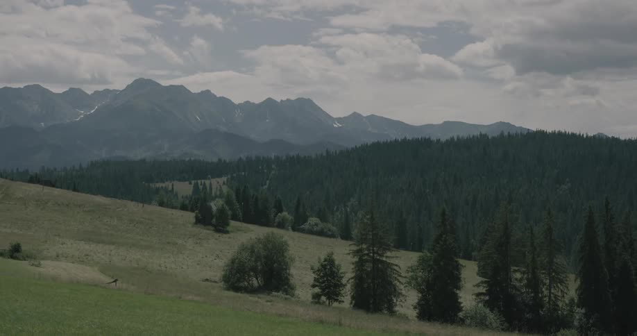 A scenery of a mountain from the hill